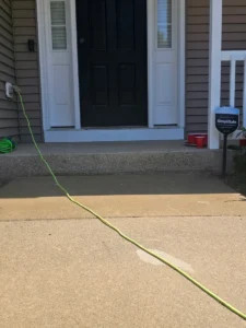 Freshly leveled concrete front walkway after concrete mud jacking service in Rochester, MN by All-Star Basements.
